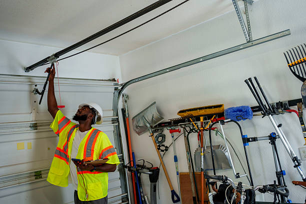 Professional Garage Door Installation technician working in El Portal, FL